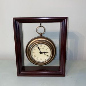 Clock by Sterling and Noble mantle or shelf clock